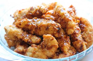 Asian Lemon Chicken Tenders - A wonderful asian twist to your favorite chicken tenders, tossed in the most heavenly sweet, lemon glaze!