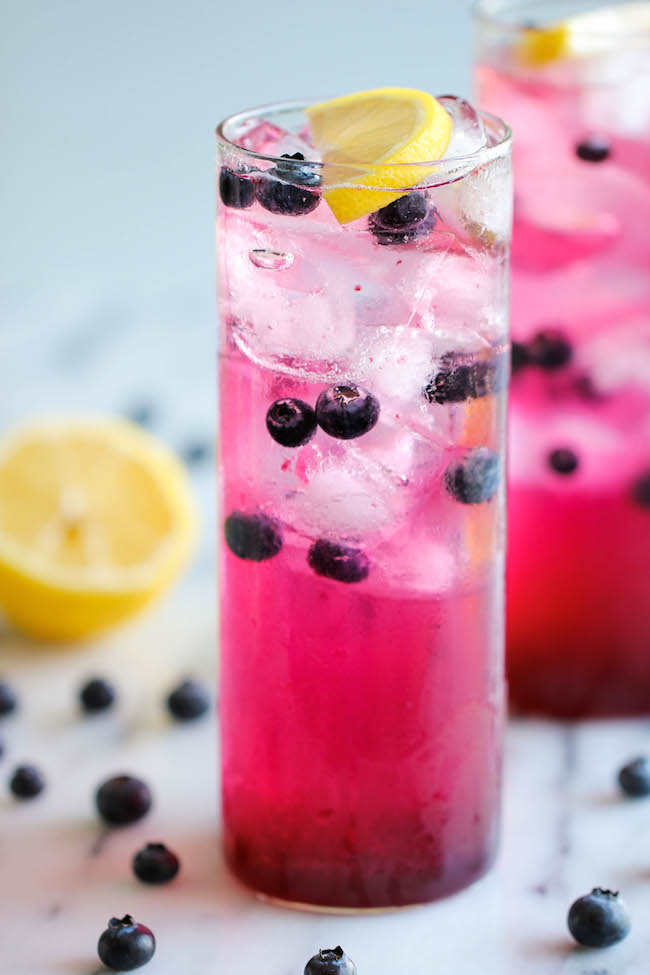Blueberry Lemonade - Made with an easy blueberry syrup, this lemonade is so refreshing, sweet and tangy! It's the perfect way to cool down!