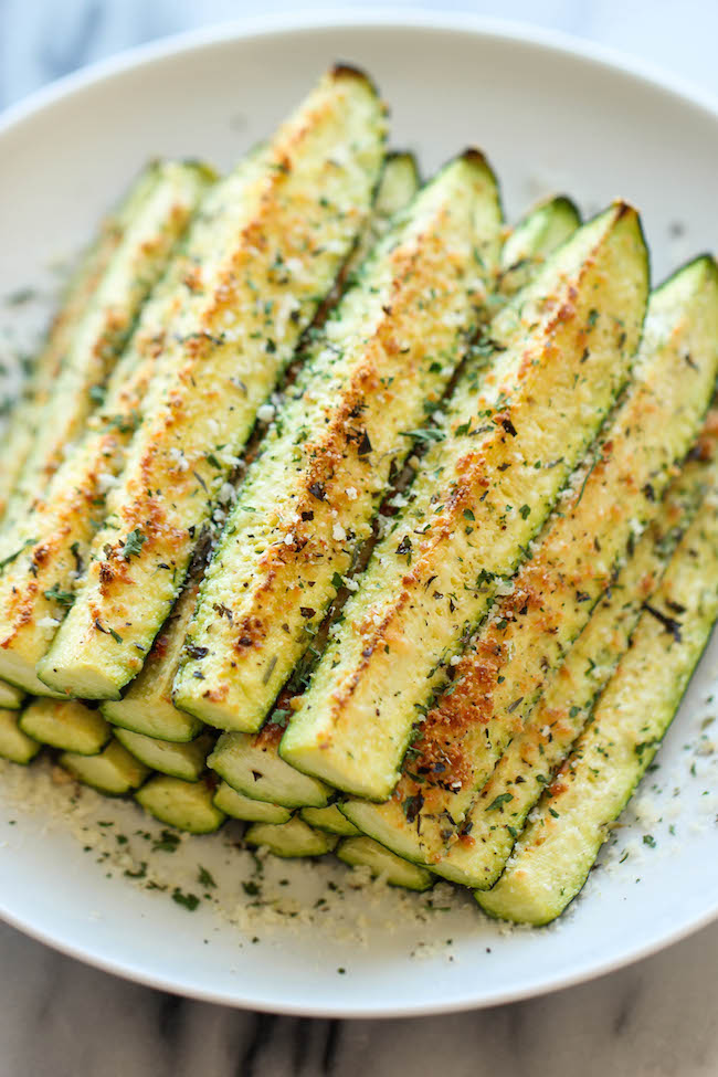 Baked Parmesan Zucchini - Crisp, tender zucchini sticks oven-roasted to perfection. It's healthy, nutritious and completely addictive!