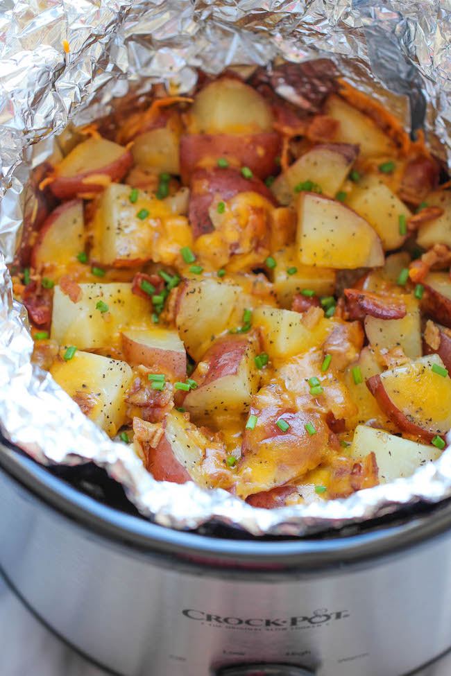 Slow Cooker Cheesy Bacon Ranch Potatoes - The easiest potatoes you can make right in the crockpot - perfectly tender, flavorful and cheesy!