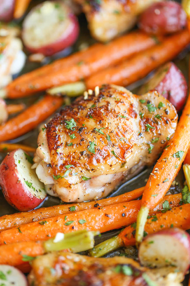 One Pan Garlic Ranch Chicken and Veggies - Crisp-tender chicken baked to absolute perfection with roasted carrots and potatoes - all cooked in a single pan!