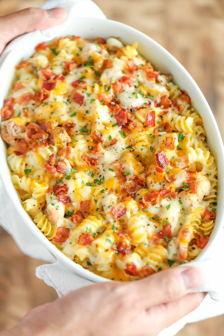 Chicken Bacon Ranch Casserole - Creamy, cheesy and comforting! Loaded with Ranch chicken, homemade alfredo sauce and bacon. Can be made ahead of time!