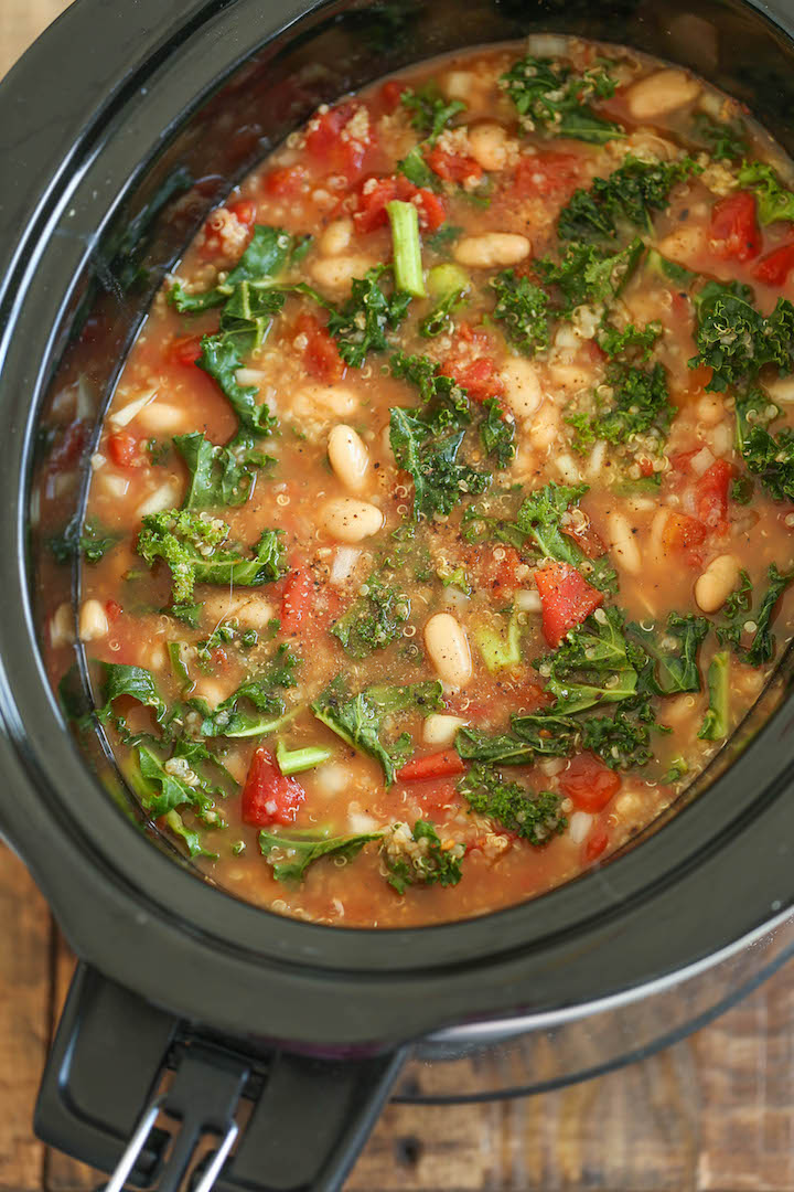 Slow Cooker Tomato, Kale and Quinoa Soup - Comforting, nourishing and healthy made in the crockpot. Even the quinoa gets cooked right in! 214.2 cal/serving.