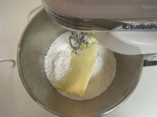 electric mixer fitted with the paddle attachment, beat powdered sugar and butter