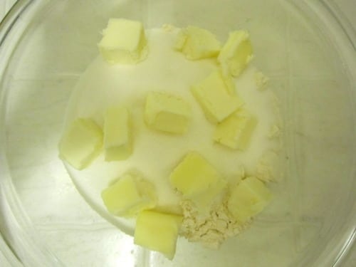 flour and sugar in a small bowl preparing to combine