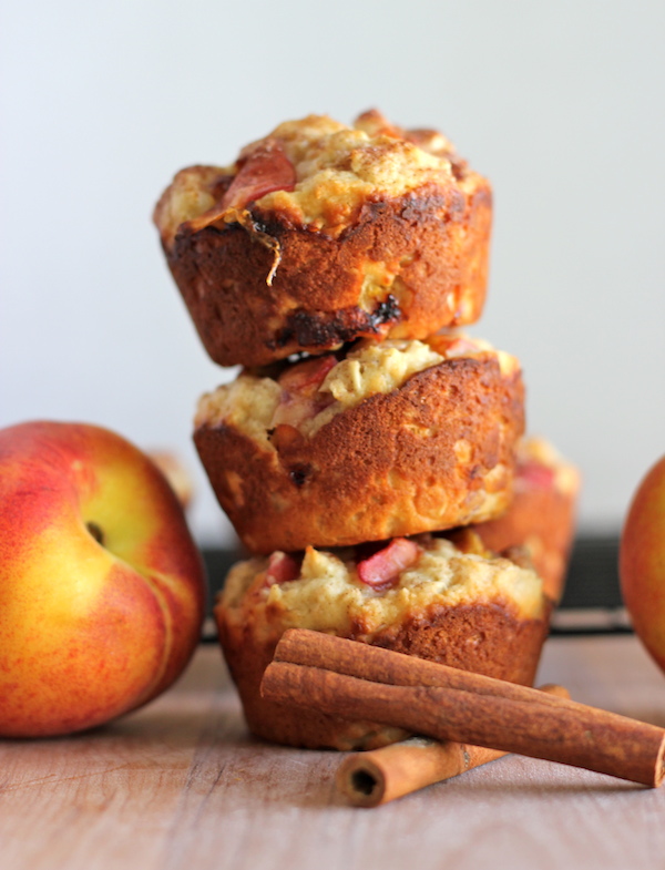 Peach Oatmeal Muffins - Wonderfully light and healthy, these cinnamon sugar crusted muffins are the perfect start to your mornings!