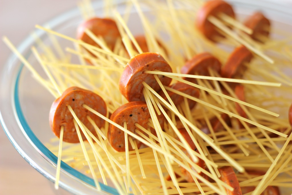 Threaded Spaghetti Hot Dog Bites with Homemade Marinara Sauce - These hot dog bites are so fun to make with both kids and grown-ups!