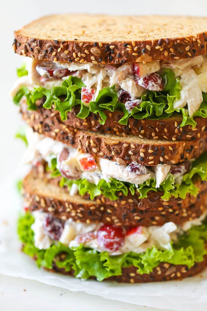 Greek Yogurt Chicken Salad Sandwich - From the plump grapes to the sweet cranberries, this lightened up sandwich won't even taste healthy! PROMISE!