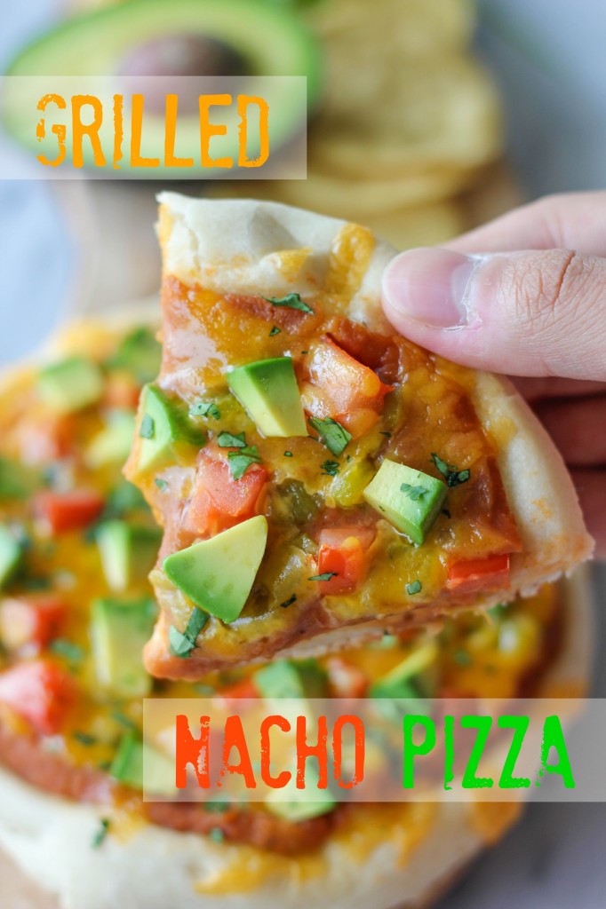Grilled Nacho Pizza - An easy grilled pizza loaded with refried beans, tomatoes, green chiles, fresh avocado and melted sharp cheddar!