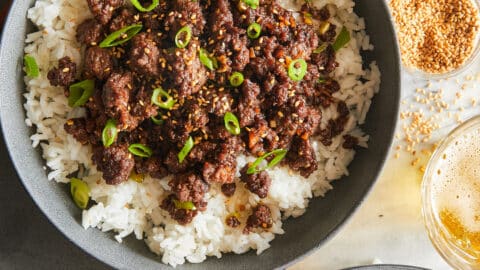 Korean beef bowl served with white rice and sesame seeds