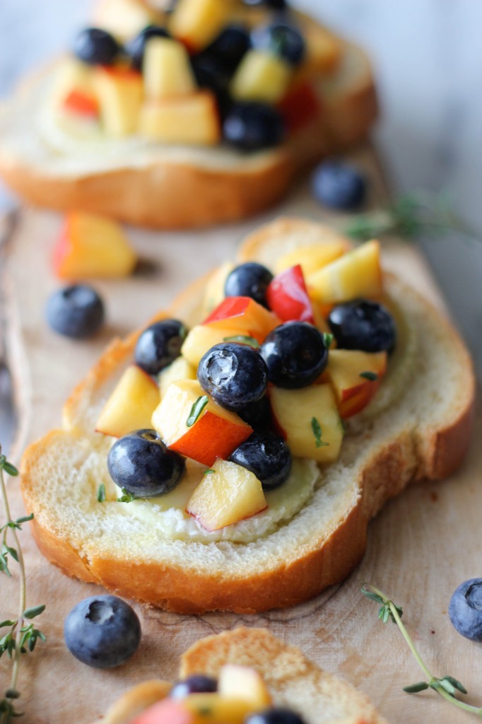 Goat Cheese Crostini with Blueberry and Peach Thyme Salsa - The flavors of summer come together for an elegant appetizer.
