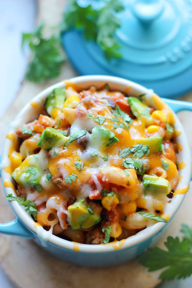 One Pot Mexican Skillet Pasta - This Mexican-inspired pasta dish can be made in 30 minutes or less. Even the pasta gets cooked right in the pot!