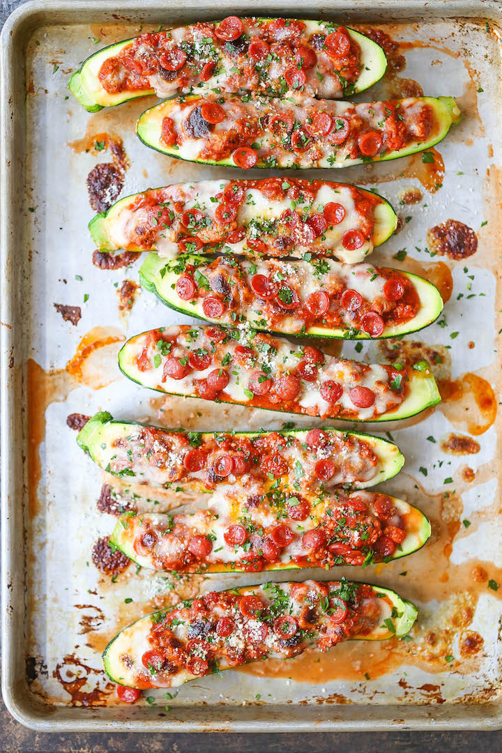 Pizza Stuffed Zucchini Boats - All the flavors of pizza neatly packed in healthy, nutritious zucchini boats! It's cheesy comfort without any of the guilt!