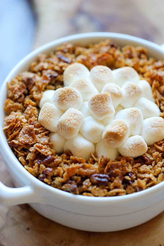 Sweet Potato Casserole - Made with mashed roasted sweet potatoes and a crunchy pecan topping with an ooey gooey melted marshmallow center!