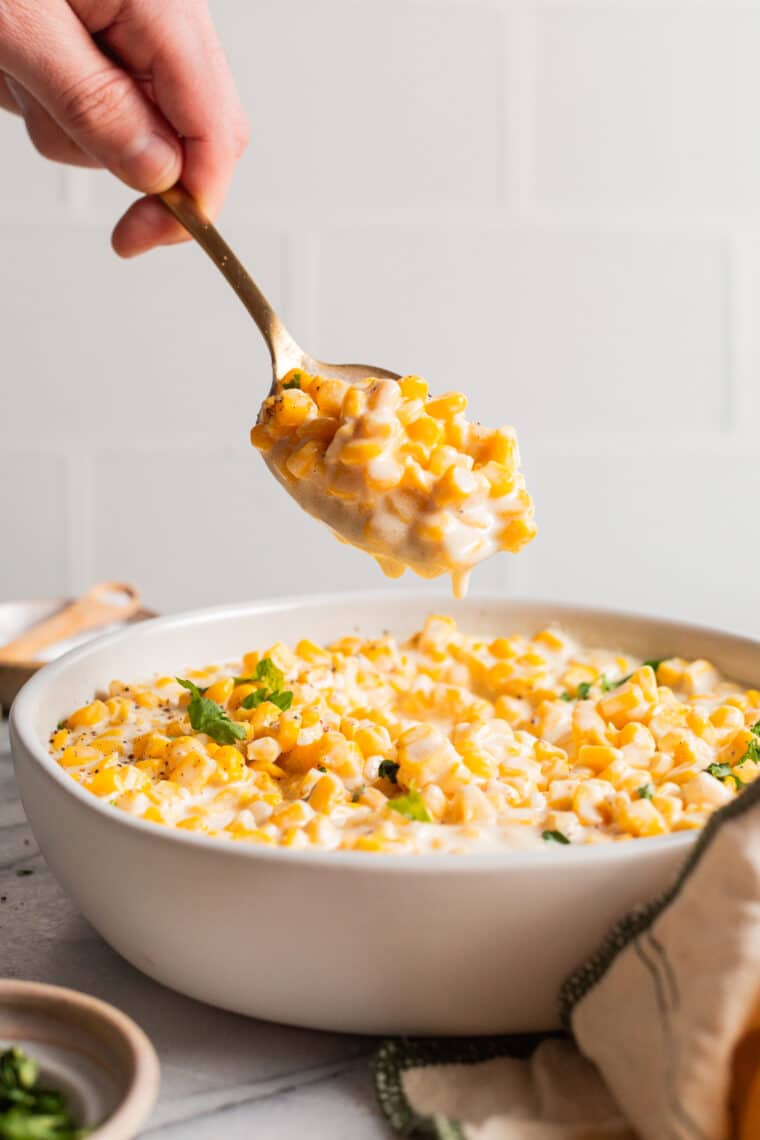 Slow Cooker Creamed Corn - The dreamiest creamed corn! So velvety and creamy, and unbelievably easy to make with just 5 ingredients. Simply set and forget. SO GOOD!