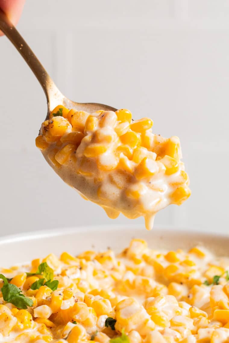 Slow Cooker Creamed Corn - The dreamiest creamed corn! So velvety and creamy, and unbelievably easy to make with just 5 ingredients. Simply set and forget. SO GOOD!