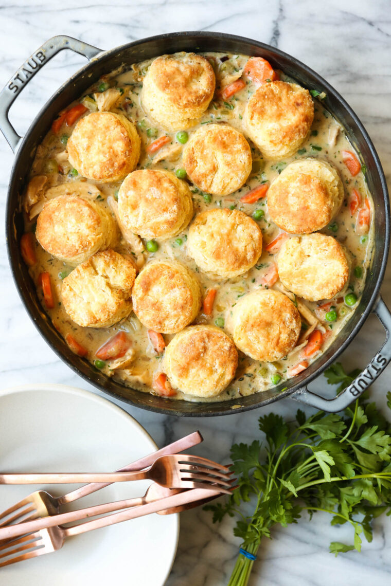 Biscuit Pot Pie - The ultimate comfort food! Topped with the flakiest, mile-high biscuits ever (made ahead of time). So cozy + so darn good!