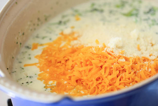 Broccoli Cheese Soup - Warm, cheesy, rich broccoli cheese soup made in less than 30 minutes. Comfort food never tasted so good!