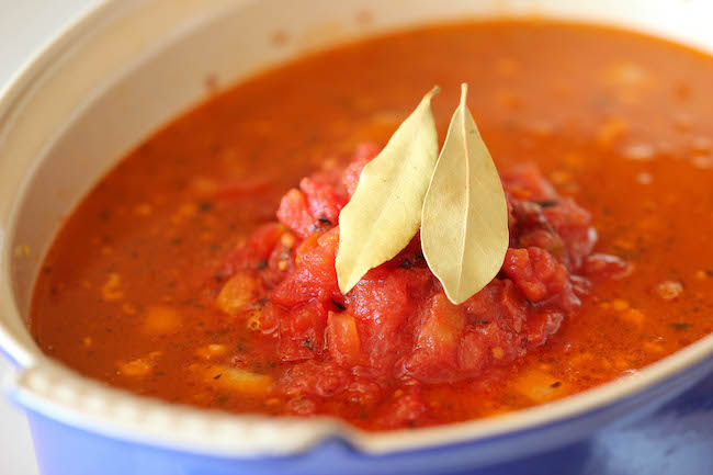 Lasagna Soup - All the flavors of lasagna in a comforting, cheesy soup with a dollop of ricotta that gets melted right into the soup!