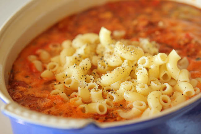 Lasagna Soup - All the flavors of lasagna in a comforting, cheesy soup with a dollop of ricotta that gets melted right into the soup!