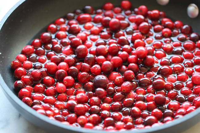 Sugared Cranberries - Incredibly simple and easy 2-ingredient sparkling cranberries. Perfect for holiday snacking or dressing up desserts!