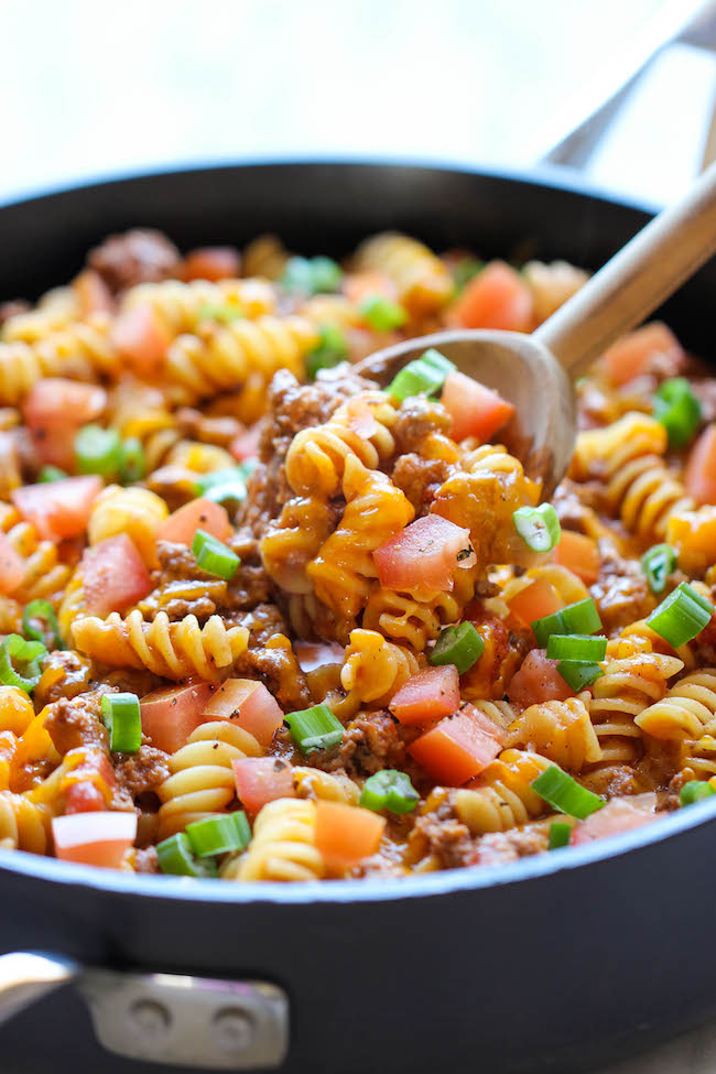 One Pot Cheeseburger Casserole - This cheesy goodness comes together so easily in one skillet. Even the pasta gets cooked right in the pan!