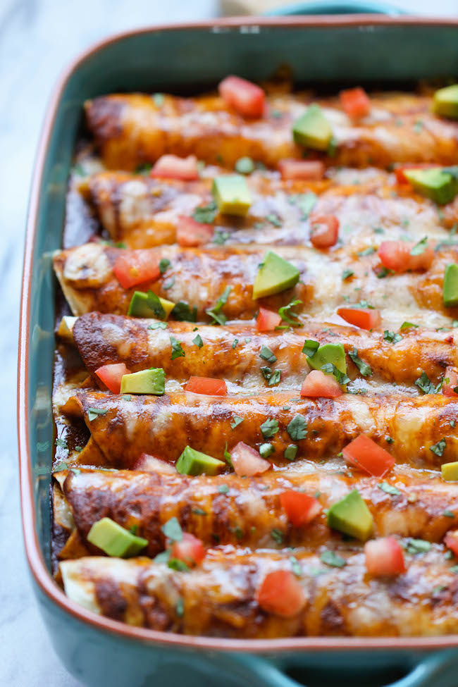 Beef Enchiladas - Loaded with a simple and hearty crumbled beef filling, these cheesy enchiladas will be on your dinner table in no time!