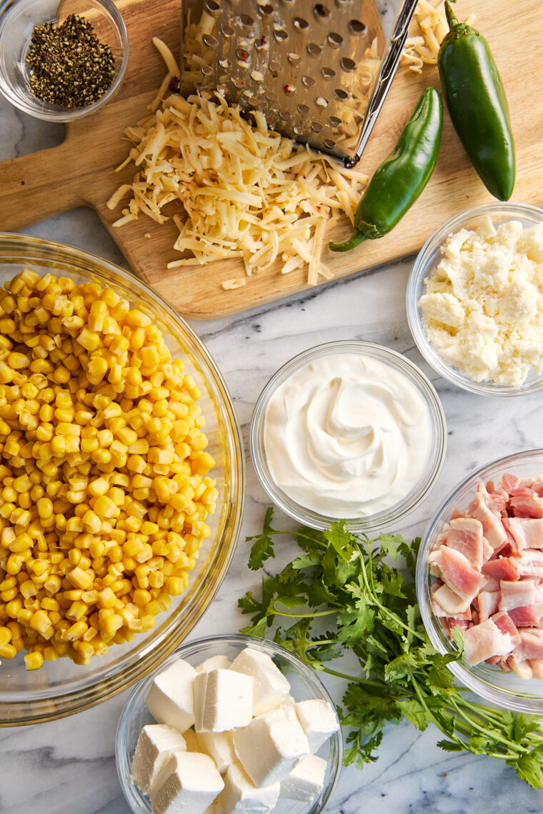 Slow Cooker Corn and Jalapeño Dip - The creamiest, easiest dip ever! Perfect for big family gatherings + game day. A huge crowd-pleaser, too!