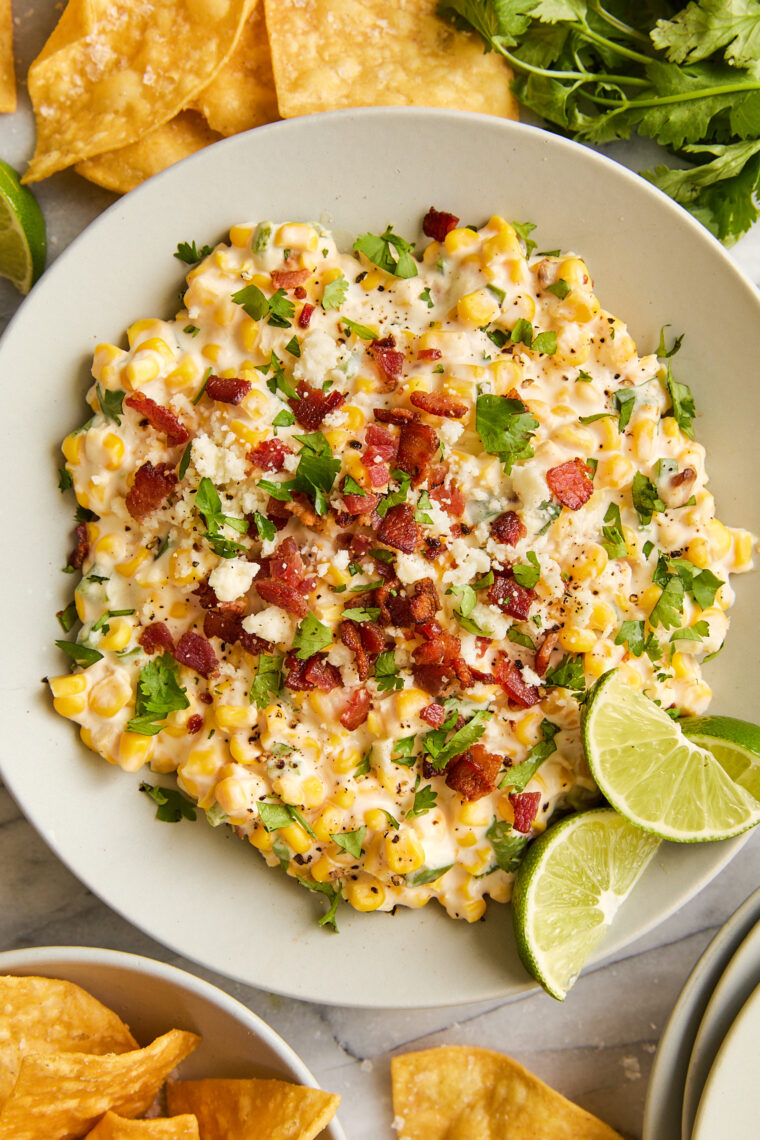 Slow Cooker Corn and Jalapeño Dip - The creamiest, easiest dip ever! Perfect for big family gatherings + game day. A huge crowd-pleaser, too!