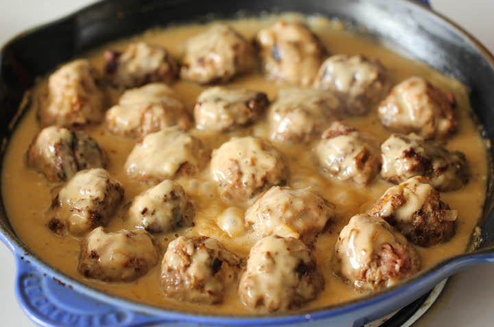 Browned meatballs in a creamy gravy sauce.