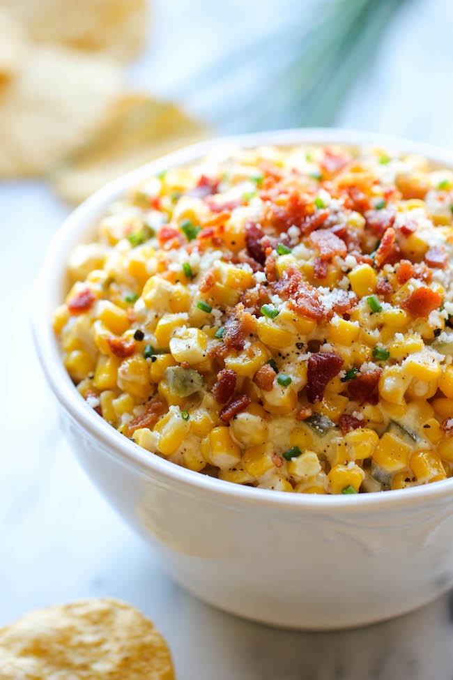 Slow Cooker Corn and Jalapeño Dip - Simply throw everything in the crockpot for the easiest, most creamiest dip ever!