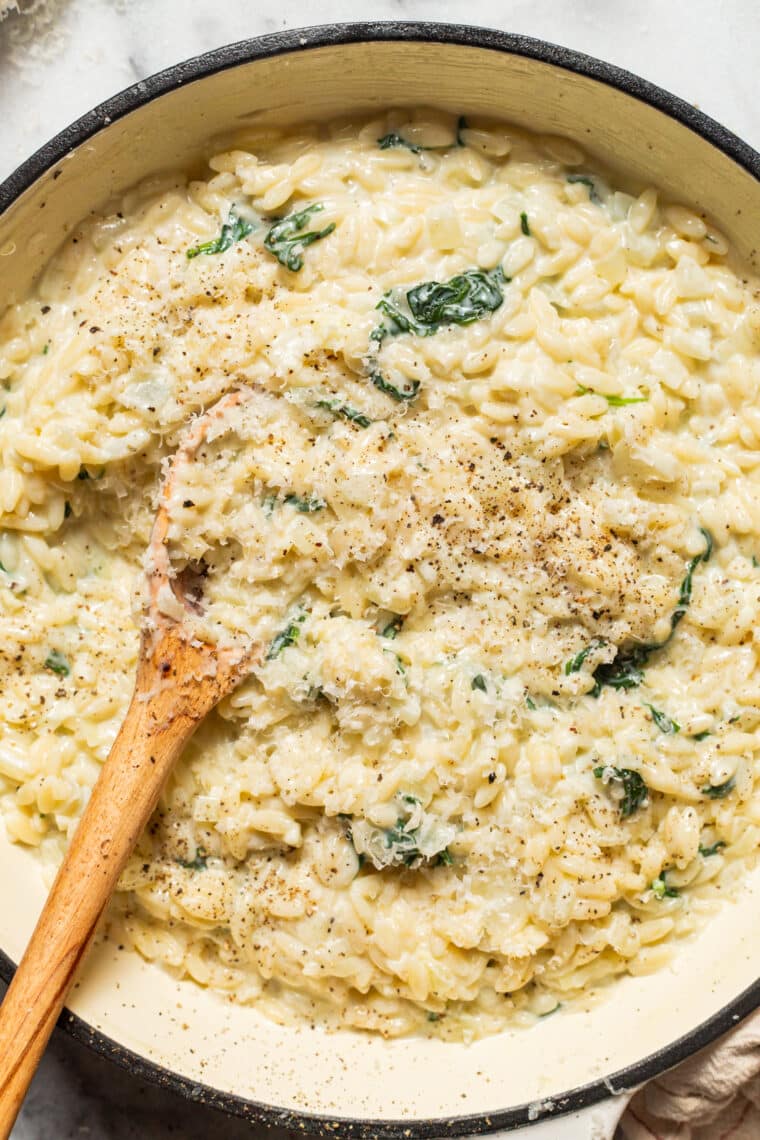 Parmesan and Spinach Orzo - This creamy, velvety orzo side dish is quick and easy + will go with any main dish! An absolute family-favorite.