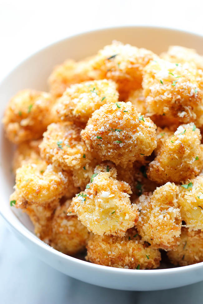 Parmesan Cauliflower Bites - Crisp, crunchy cauliflower bites that even the pickiest of eaters will love. Perfect as an appetizer or snack!