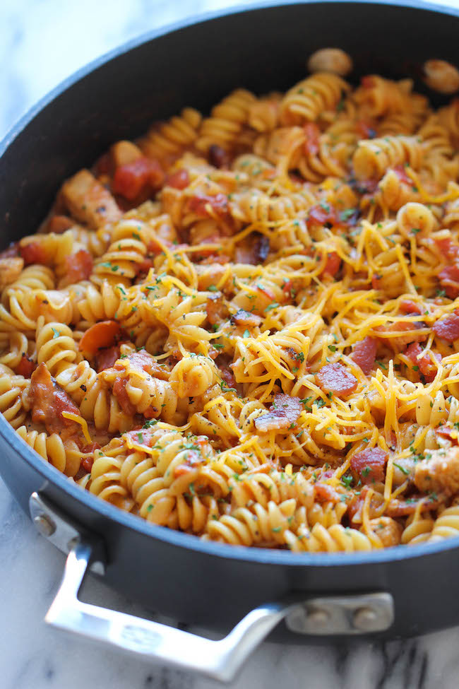 One Pot BBQ Chicken Pasta - Loaded with tangy BBQ sauce and crisp bacon. It's so easy, even the pasta gets cooked right in the pot!