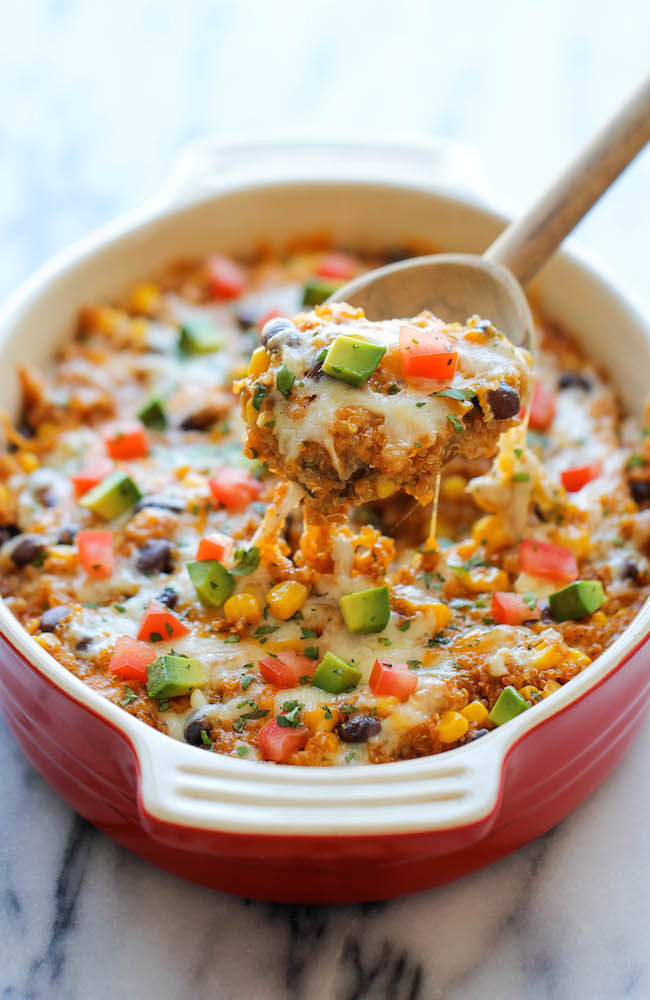 Quinoa Enchilada Casserole - A lightened-up, healthy enchilada bake that you can enjoy guilt-free, chockfull of quinoa, black beans and cheesy goodness!