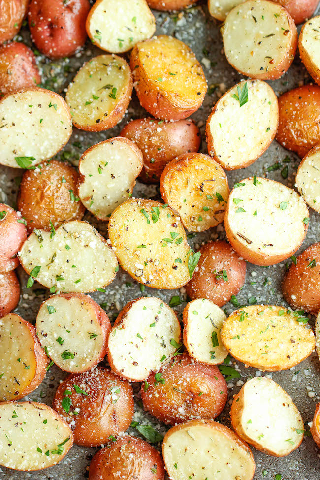Garlic Parmesan Roasted Potatoes - These buttery garlic potatoes are tossed with Parmesan goodness and roasted to crisp-tender perfection!