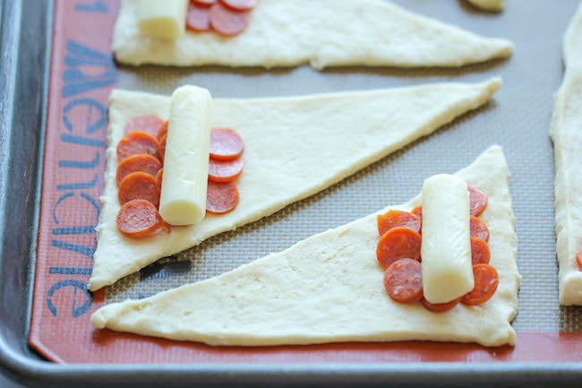 Pizza Roll Ups - These cheesy 5-ingredient pizza roll-ups come together so quickly and easily without the fuss. Perfect for snacking or game day!