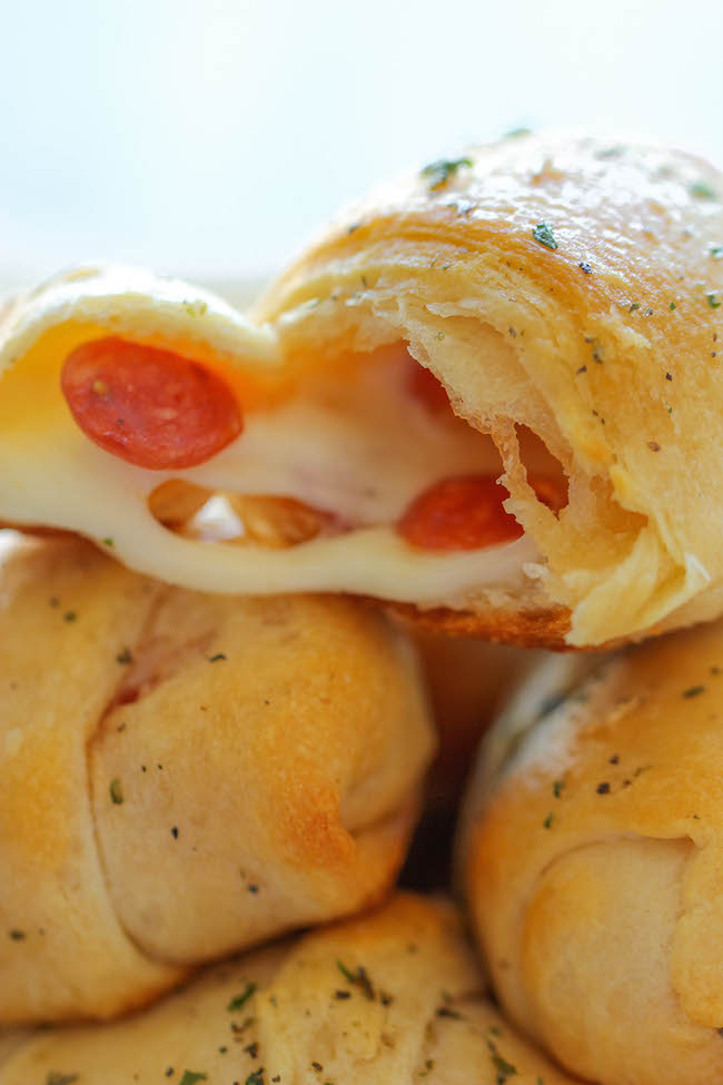 Pizza Roll Ups - These cheesy 5-ingredient pizza roll-ups come together so quickly and easily without the fuss. Perfect for snacking or game day!
