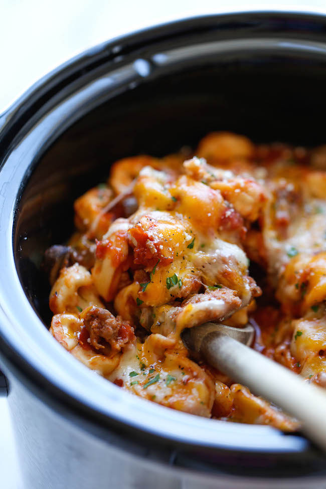 Slow Cooker Cheesy Tortellini - There's nothing better than coming home to the cheesiest tortellini ever, and yes, it's easily made right in the crockpot!