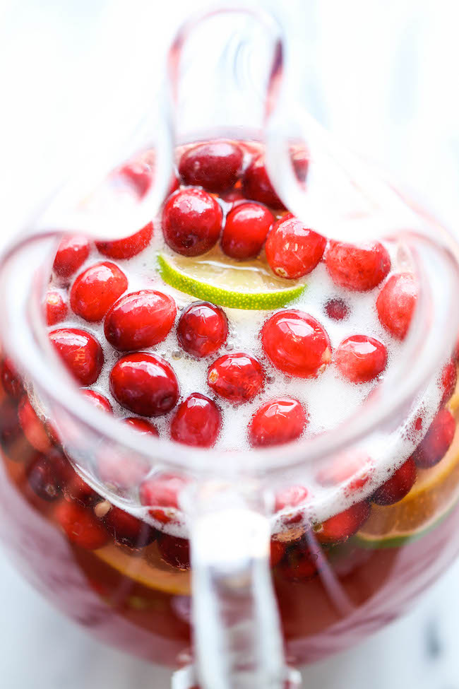 Cranberry Punch - A super easy, refreshing drink so perfect for the holidays! And you can even make this an alcoholic drink for the grown-ups!