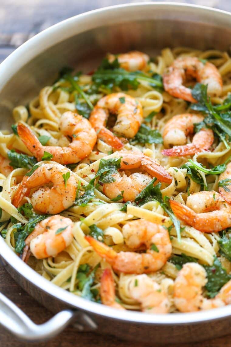 Garlic Butter Shrimp Pasta - Garlicky shrimp and fettuccine topped with fresh Parmesan! Quick for busy weeknights but fancy enough for weekend company! So simple so good.