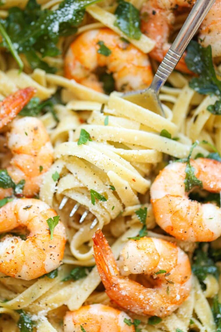 Garlic Butter Shrimp Pasta - Garlicky shrimp and fettuccine topped with fresh Parmesan! Quick for busy weeknights but fancy enough for weekend company! So simple so good.