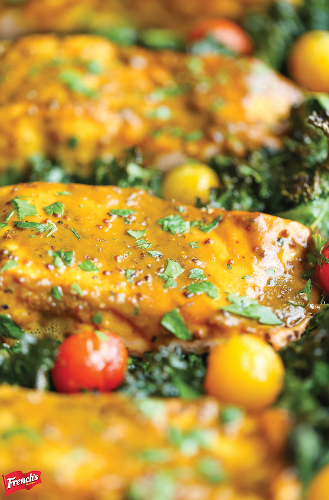 One Pan Salmon and Veggies - The easiest, most flavorful honey mustard salmon you will ever make with roasted kale and tomatoes, all cooked in a single pan!