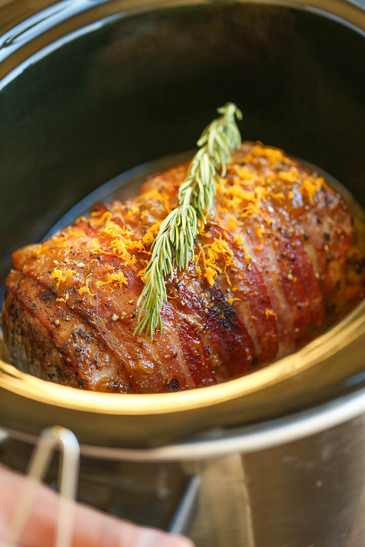 Slow Cooker Bacon Wrapped Pork Loin - Because bacon makes everything better, especially when it's effortlessly slow cooked with a brown sugar glaze!