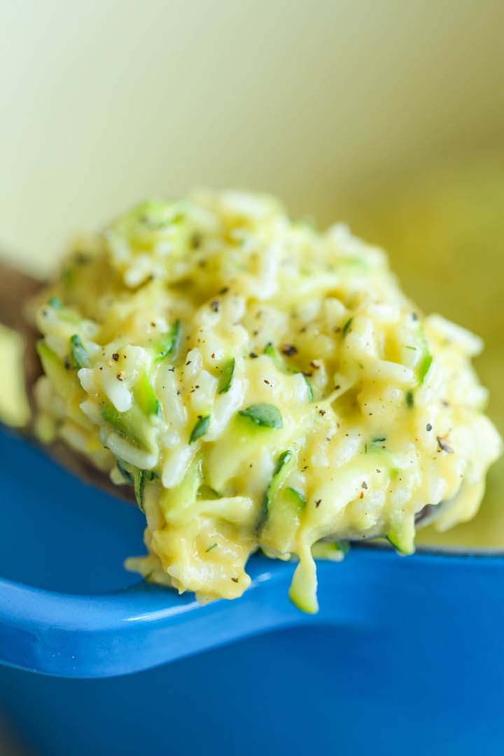Cheesy Garlic Zucchini Rice - Made in ONE POT! So easy. So cheesy. So garlicky. A side dish for all of your meals! Can be made with brown rice or quinoa.
