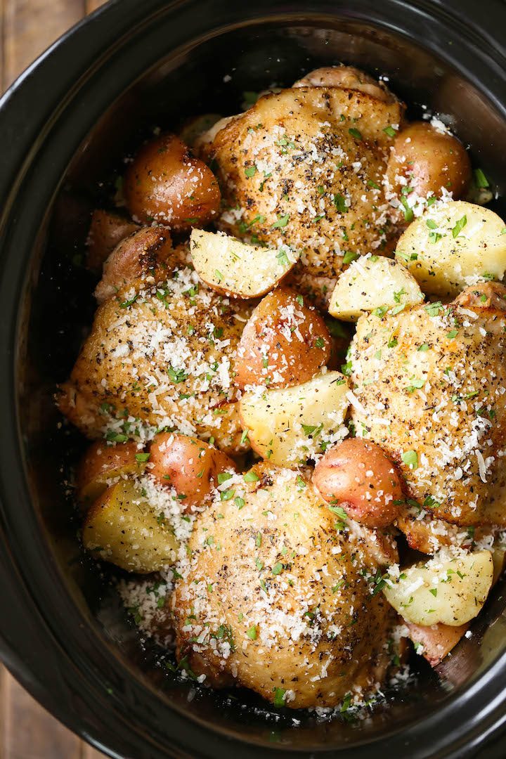 Slow Cooker Garlic Parmesan Chicken and Potatoes - Crisp-tender chicken cooked low and slow with baby red potatoes for a full meal! So easy and effortless!