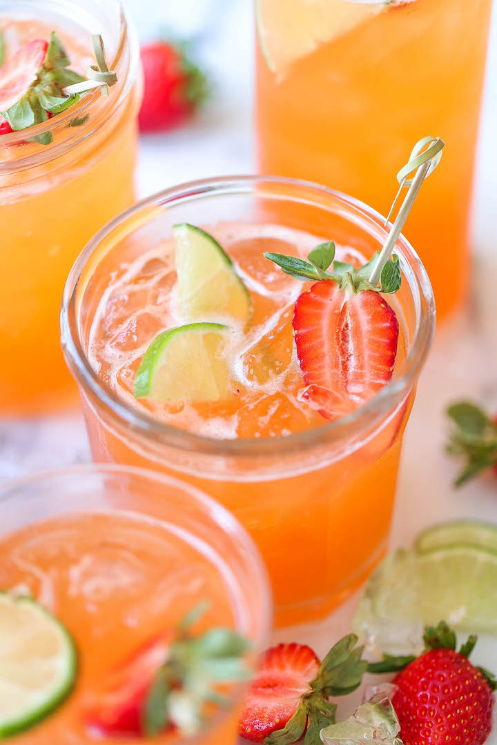 Strawberry Pineapple Mojito - A fun, sweet tropical twist to everyone's favorite cocktail! And you can easily transform this to a non-alcoholic drink!