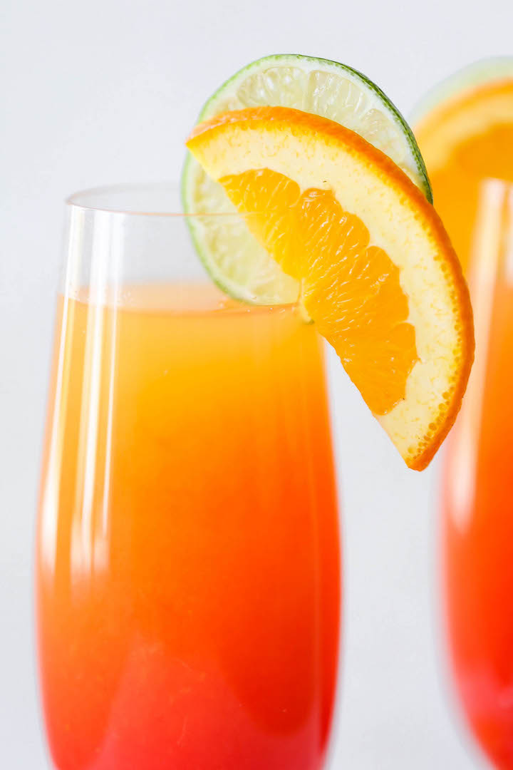Tequila Sunrise Mimosa - Easy peasy 4-ingredient mimosas that are sure to impress everyone! Plus, you only need 5 minutes to whip this up. That's it!