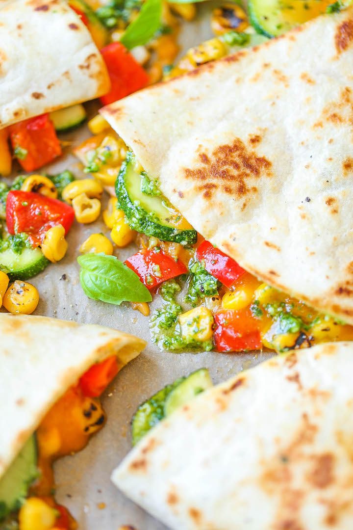 Zucchini Corn Quesadillas - This is so quick, simple and light! And with homemade (or store-bought pesto), this comes together in minutes. It's fool-proof!