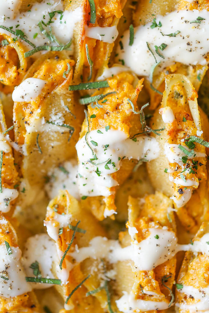 Pumpkin Stuffed Shells - Luxuriously creamy, rich and comforting with the most epic garlic parmesan cream sauce that you'll want to put on everything!